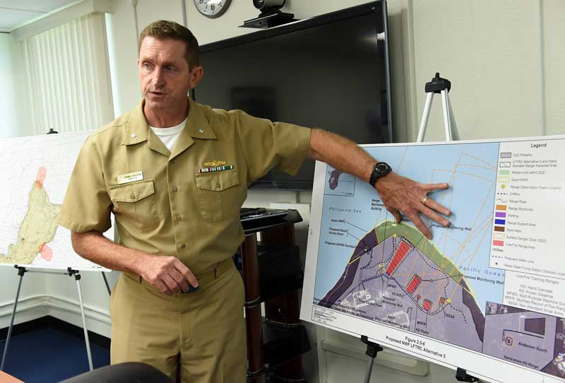 Commander Daniel Schaan at Naval Base Guam discusses buildup and refurbishment plans for the island. Japan is paying for more than a third of the approximately $8.7 billion to create new Marine facilities on the island, a popular military hub in the Pacific. (Tiffany Tompkins-Condie, McClatchy.)