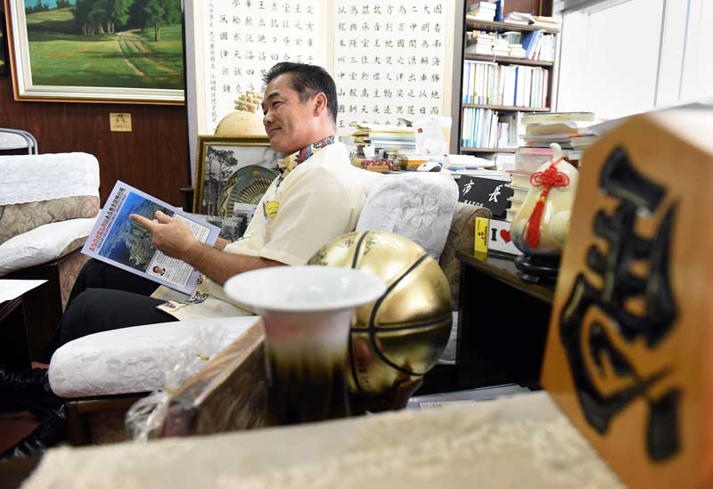 Marine Corps Air Station Futenma, located in the center of Ginowan Mayor Sakima Atsushi's city, occupies about a quarter of the land in the Japanese city. The mayor wants to redevelop the military base to bring new civilian jobs and housing to the area. (Tiffany Tompkins-Condie, McClatchy.)