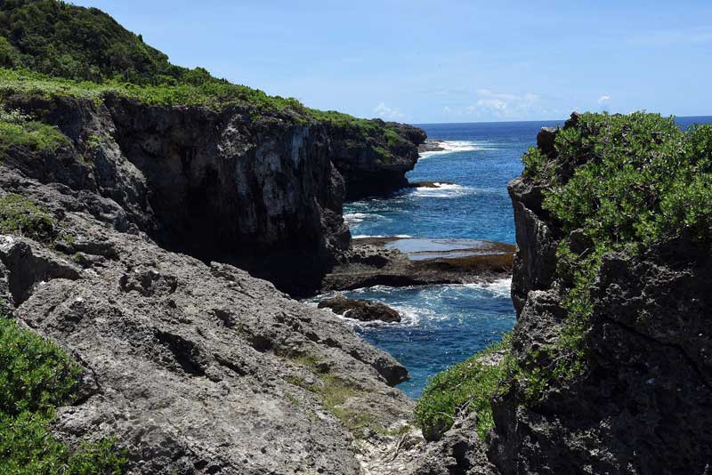 Pagat, culturally important land for Guam as an ancient Chamorro Village site, was once going to be subject to restricted access by the military for a nearby firing range; a shift of plans for the firing range to move to another location on the island leaves the site in its present condition. Photo taken on Aug. 8, 2015. (Tiffany Tompkins-Condie, McClatchy.)