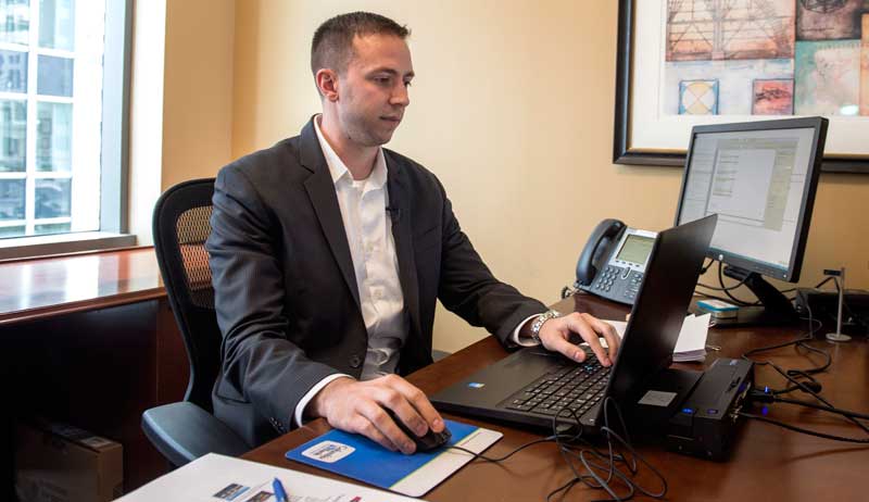 For years after his 2009-10 deployment with the 1-17, Dan Boirum struggled with guilt because he turned away from his best friend, Dan Berchinski, when he was hit by a mine and lost both his legs. Both men have flourished since. Berchinski is finishing an MBA at Stanford and Boirum is working on an MBA at UW and is interning this summer with Columbia Bank in Seattle. (Drew Perine, staff photographer.)