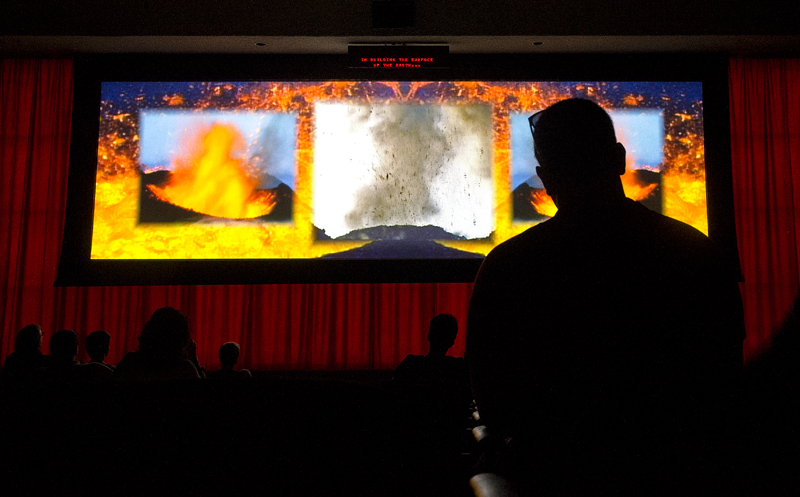 Crowds watch in rapt silence last year during a movie depicting the 1980 eruption of Mt. St. Helens at the Johnston Ridge Observatory. (Dean J. Koepfler, staff file, 2014.)